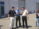 Teachers Institute Instructor Nathan McCray, K9CPO (left), helps TI participants make a satellite QSO at the California session. [Photo courtesy of Nathan McCray, K9CPO]