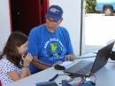 Dave, N6TEB with granddaughter Jessie (10) working the VHF station.